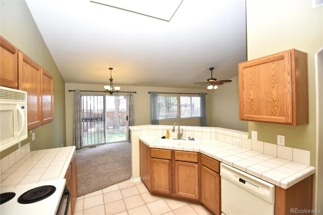 a spacious bathroom with a sink and a large mirror