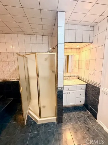 a bathroom with a bathtub and a window
