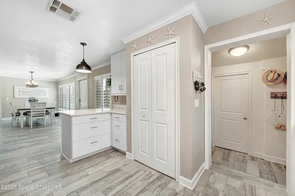 a storage room with washer and dryer