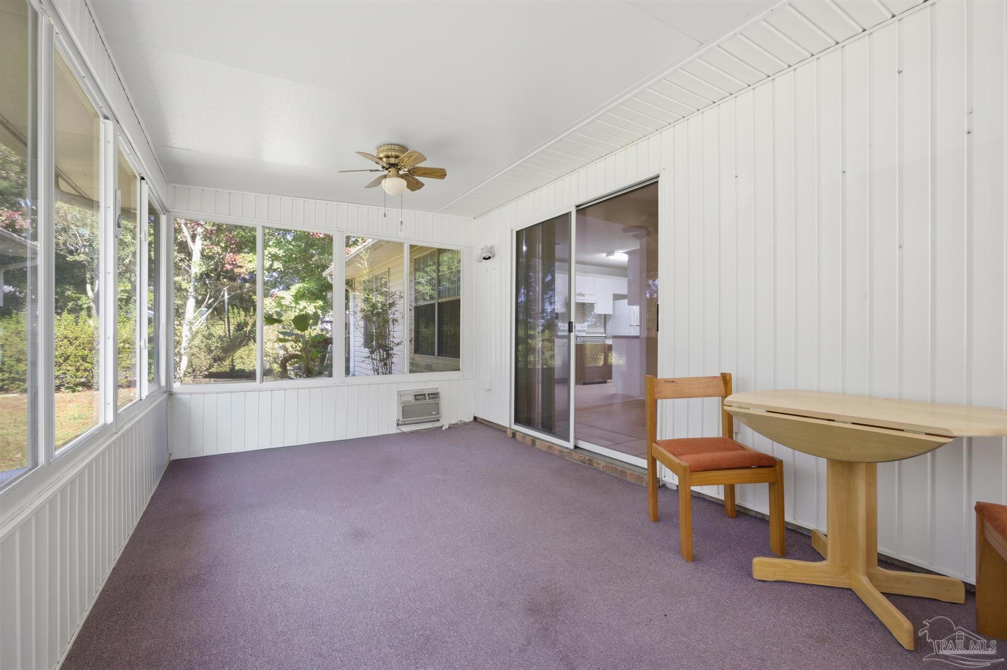 4327 Chantilly Way Milton, FL 32583 - Photo 18 of 32 wooden floor in an empty room with a window