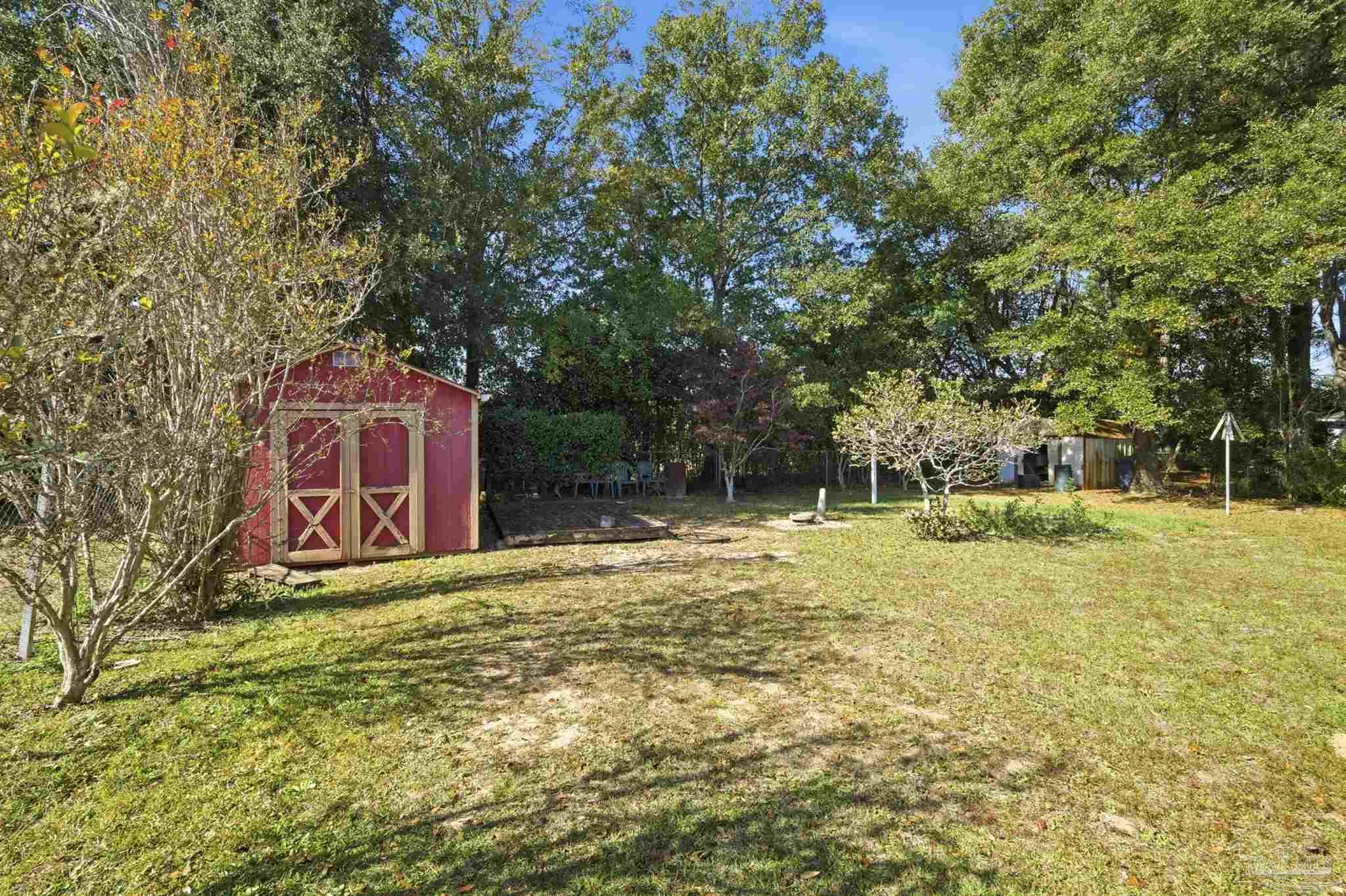 4327 Chantilly Way Milton, FL 32583 - Photo 21 of 32 a sign that is sitting in the middle of a yard