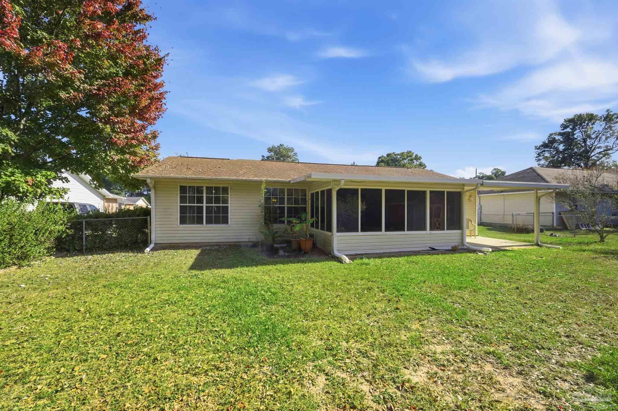 4327 Chantilly Way Milton, FL 32583 - Photo 23 of 32 a view of a house with a yard