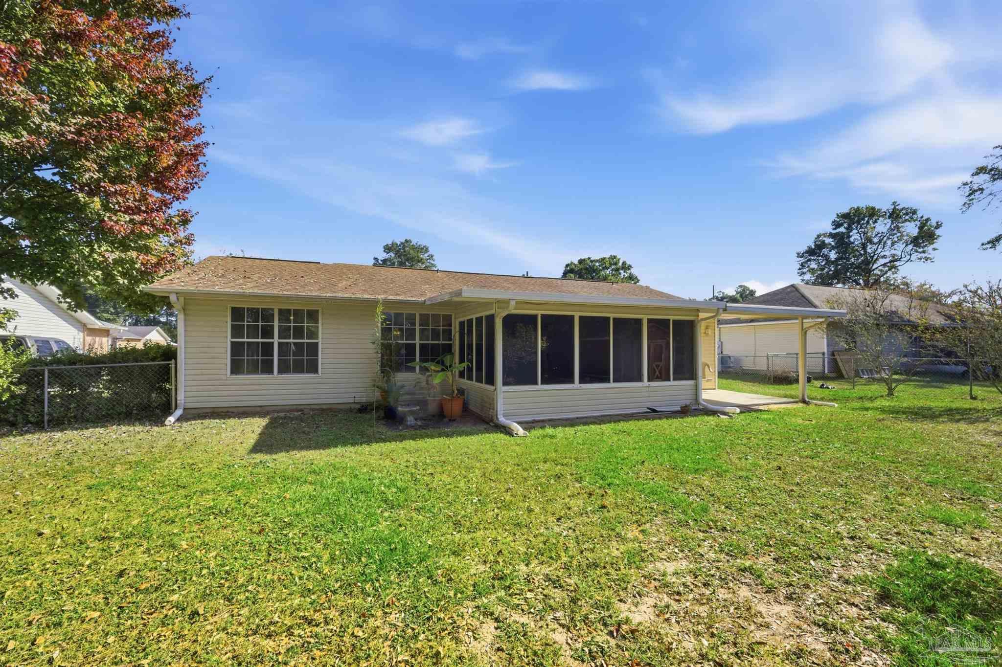 4327 Chantilly Way Milton, FL 32583 - Photo 24 of 32 front view of a house with a yard