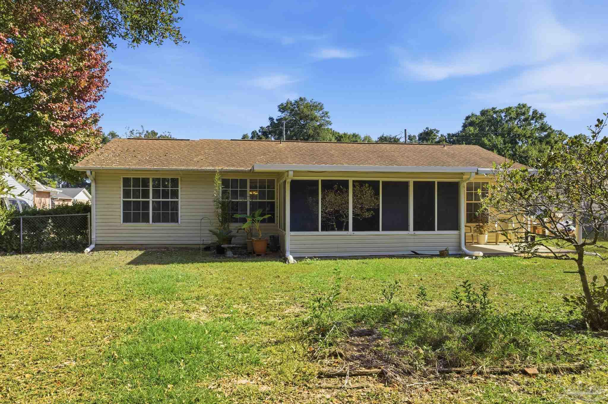 4327 Chantilly Way Milton, FL 32583 - Photo 25 of 32 a view of a house with a yard
