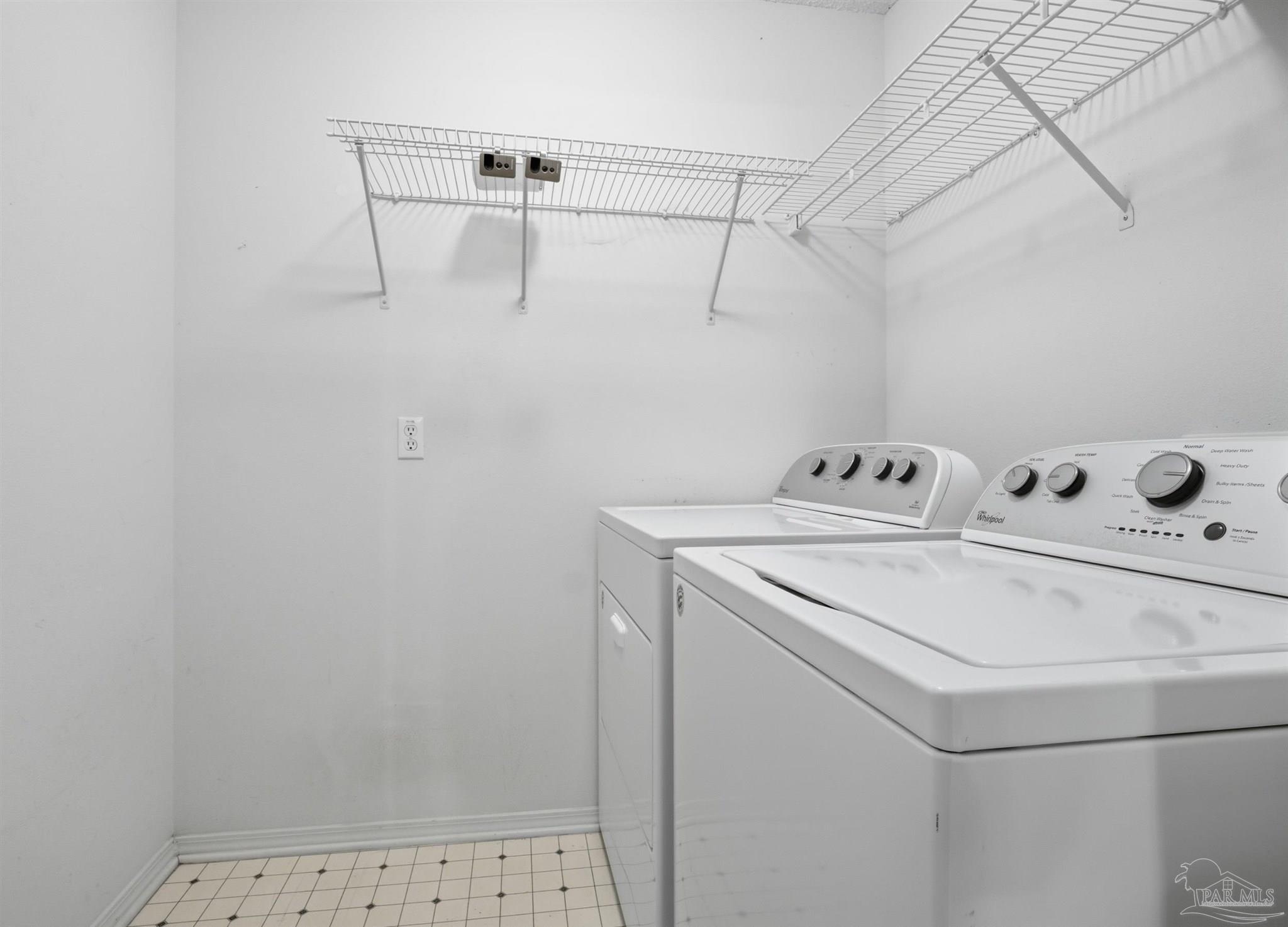 4327 Chantilly Way Milton, FL 32583 - Photo 27 of 32 a utility room with dryer and washer