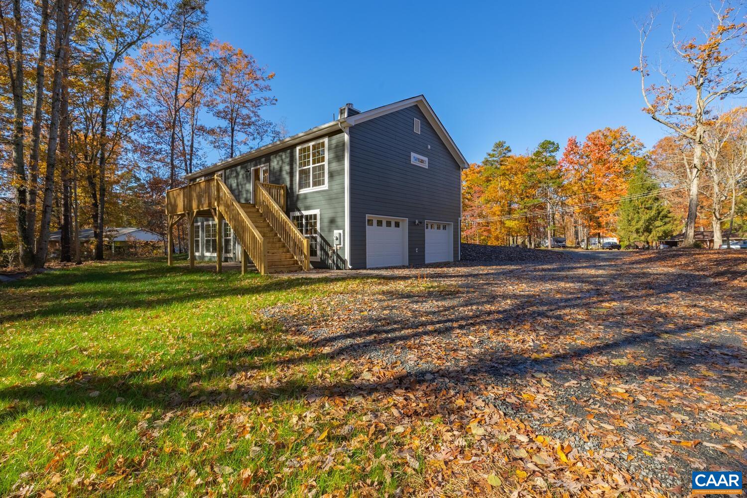 383 Logtrac Road Stanardsville, VA 22973 - Photo 7 of 39 a view of a big room with a small yard