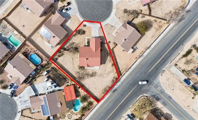 a view of a house with a street