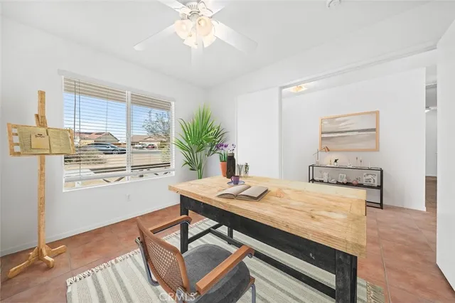 a living room with furniture fireplace and a flat screen tv