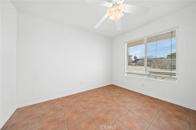 a view of kitchen with furniture and window