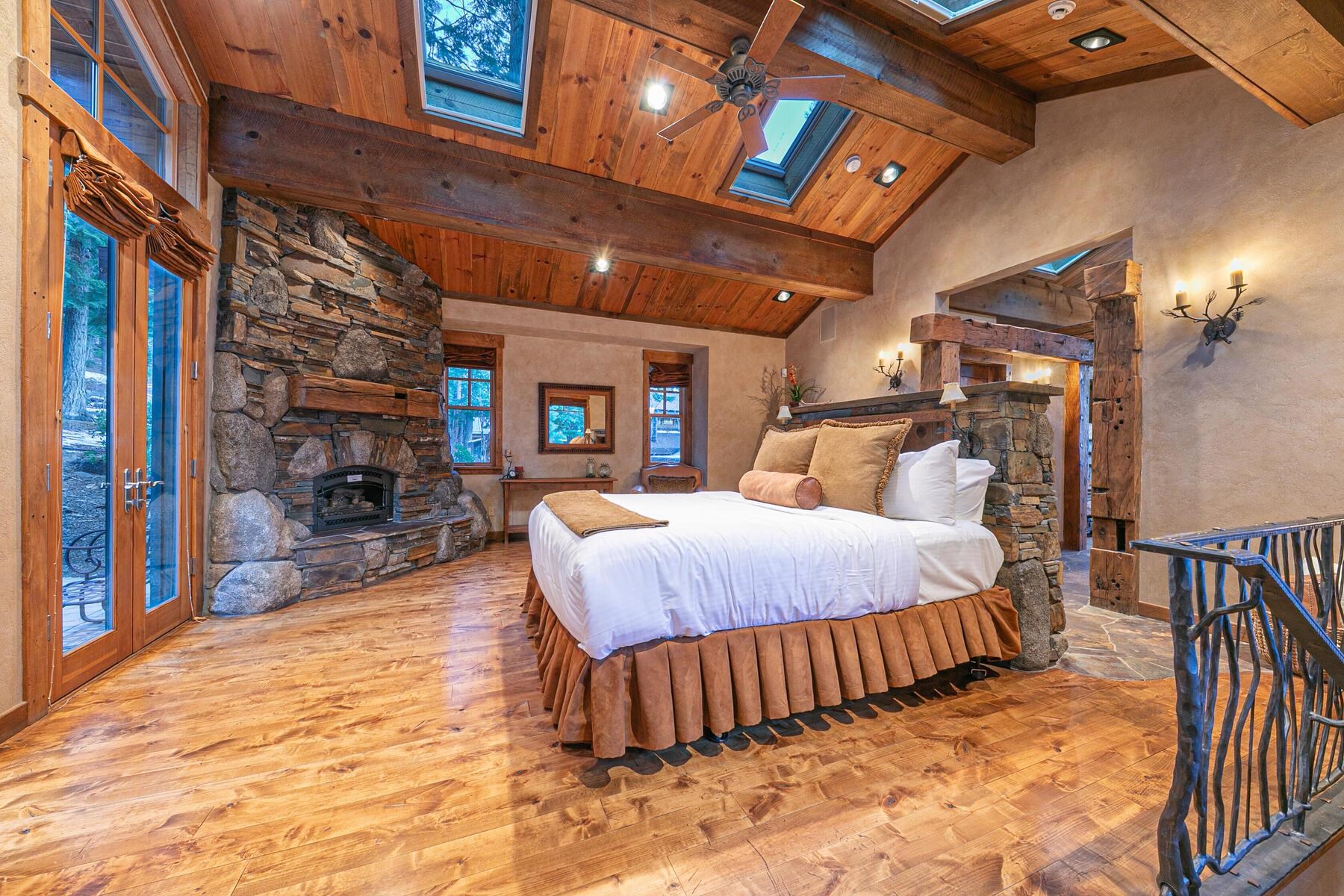 1768 Grouse Ridge Road Truckee, CA 96161 - Photo 11 of 28 a bed room with a bed and a chair