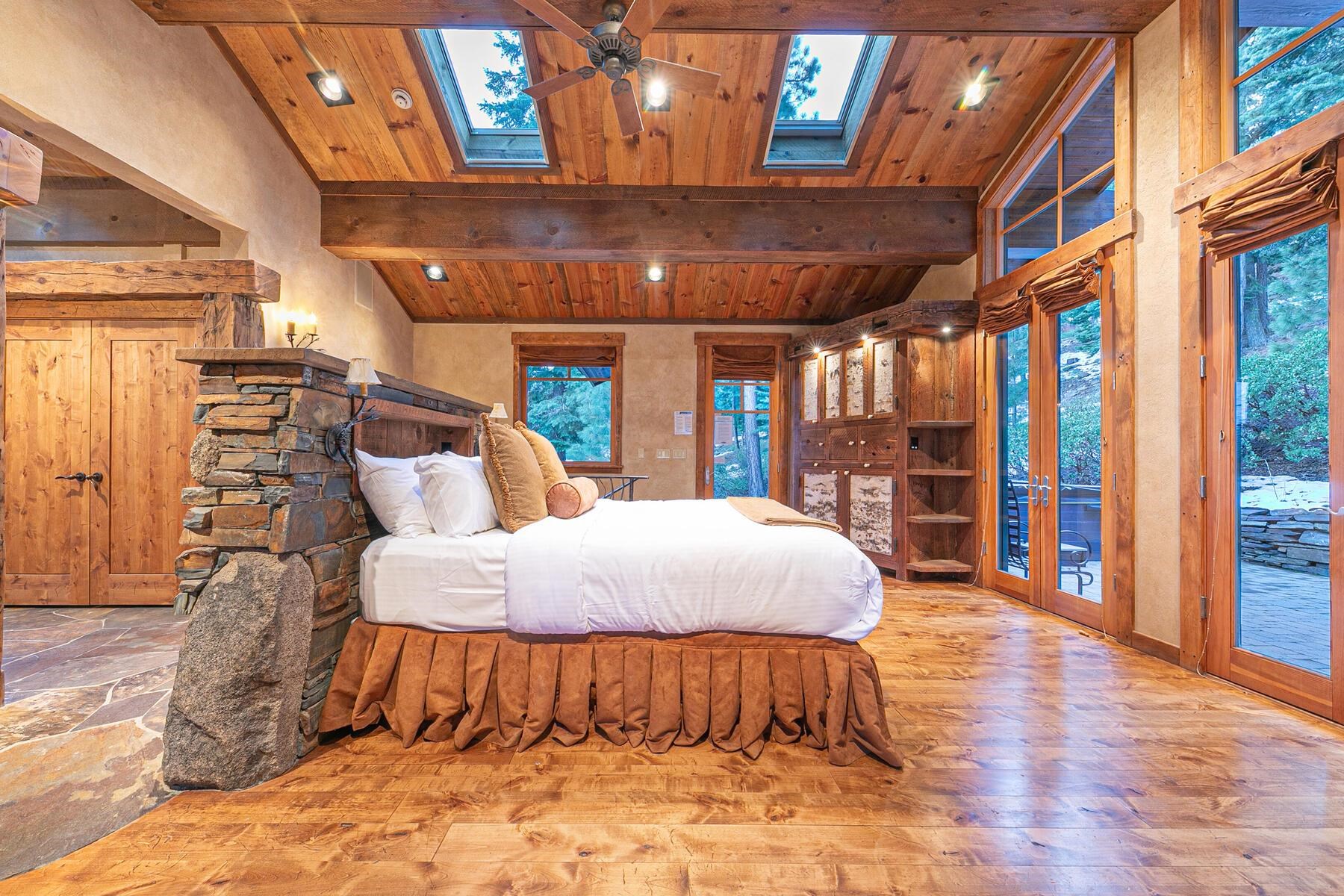 1768 Grouse Ridge Road Truckee, CA 96161 - Photo 12 of 28 a bed room with a bed and a large window