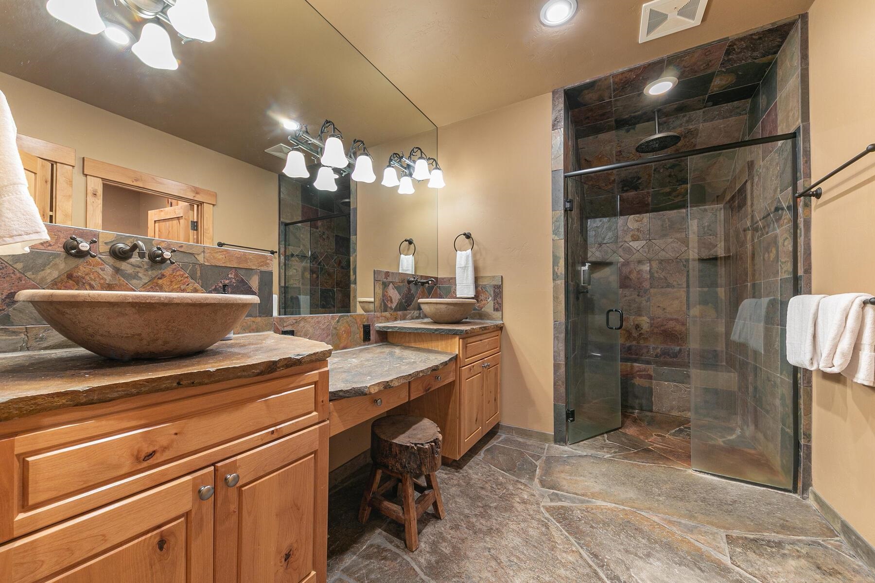 1768 Grouse Ridge Road Truckee, CA 96161 - Photo 21 of 28 a kitchen with a sink and refrigerator