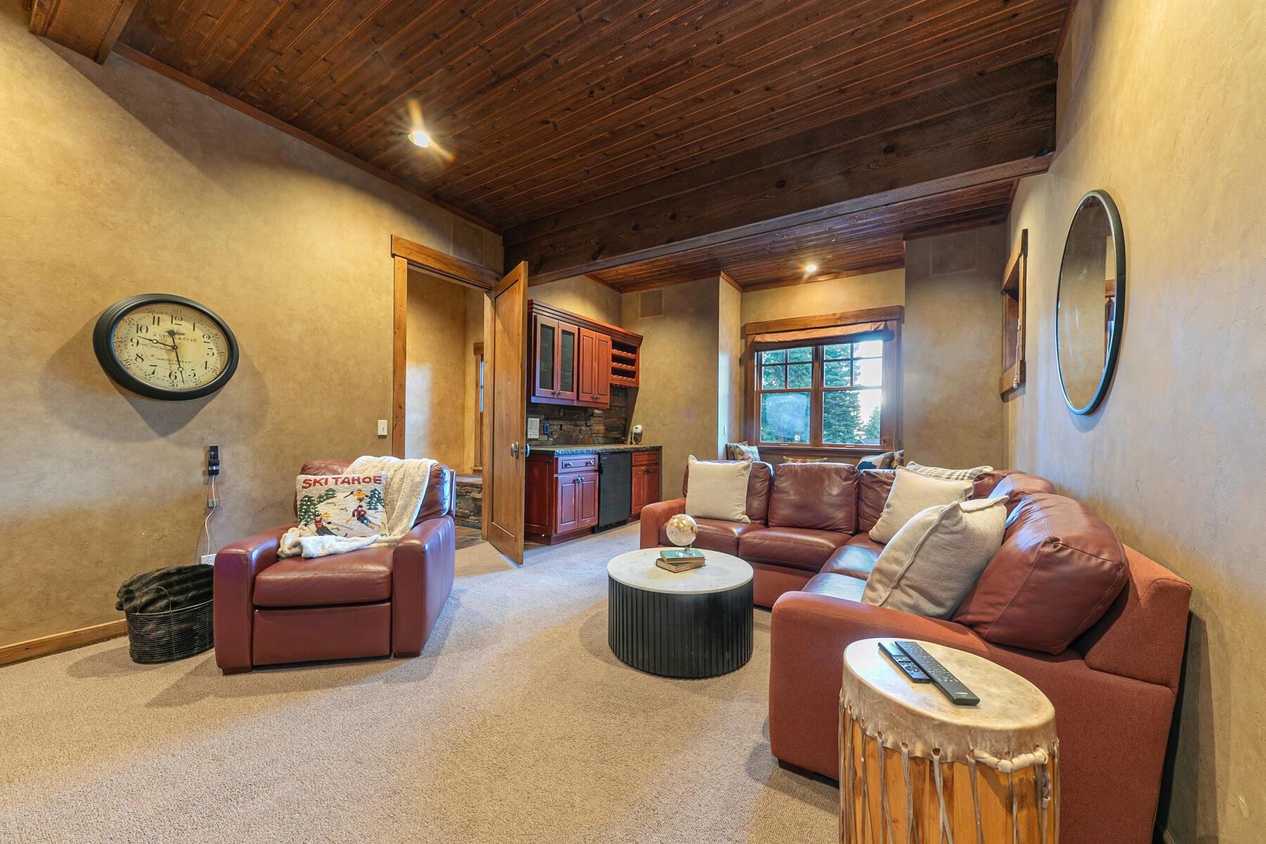 1768 Grouse Ridge Road Truckee, CA 96161 - Photo 23 of 28 a living room with furniture and a clock
