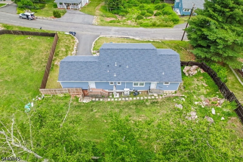 36 Forest Road Andover, NJ 07821 - Photo 13 of 50 a view of a house with a backyard