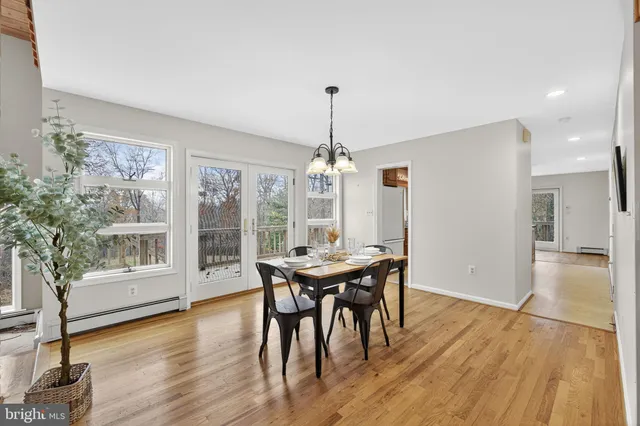 a view of room with a large window and floor to ceiling window