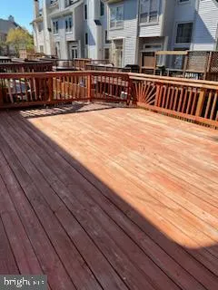a view of a swimming pool with seating space