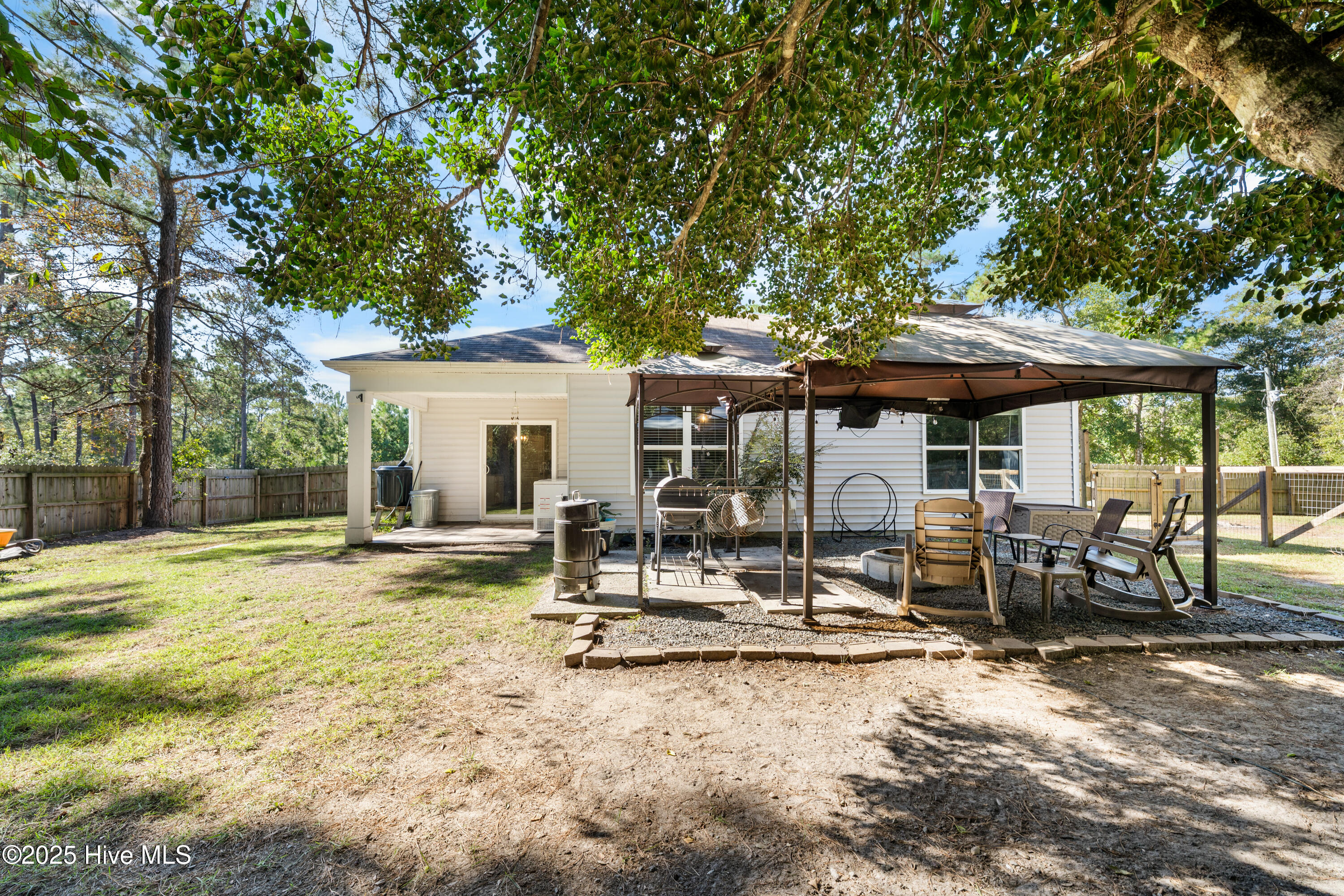 430 Ellis Road Southeast, Unit LOT #55 Bolivia, NC 28422 - Photo 64 of 111 Enjoy nights out around the fire pit in backyard or a backyard BBQ
