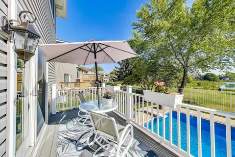 a view of a lake with a yard