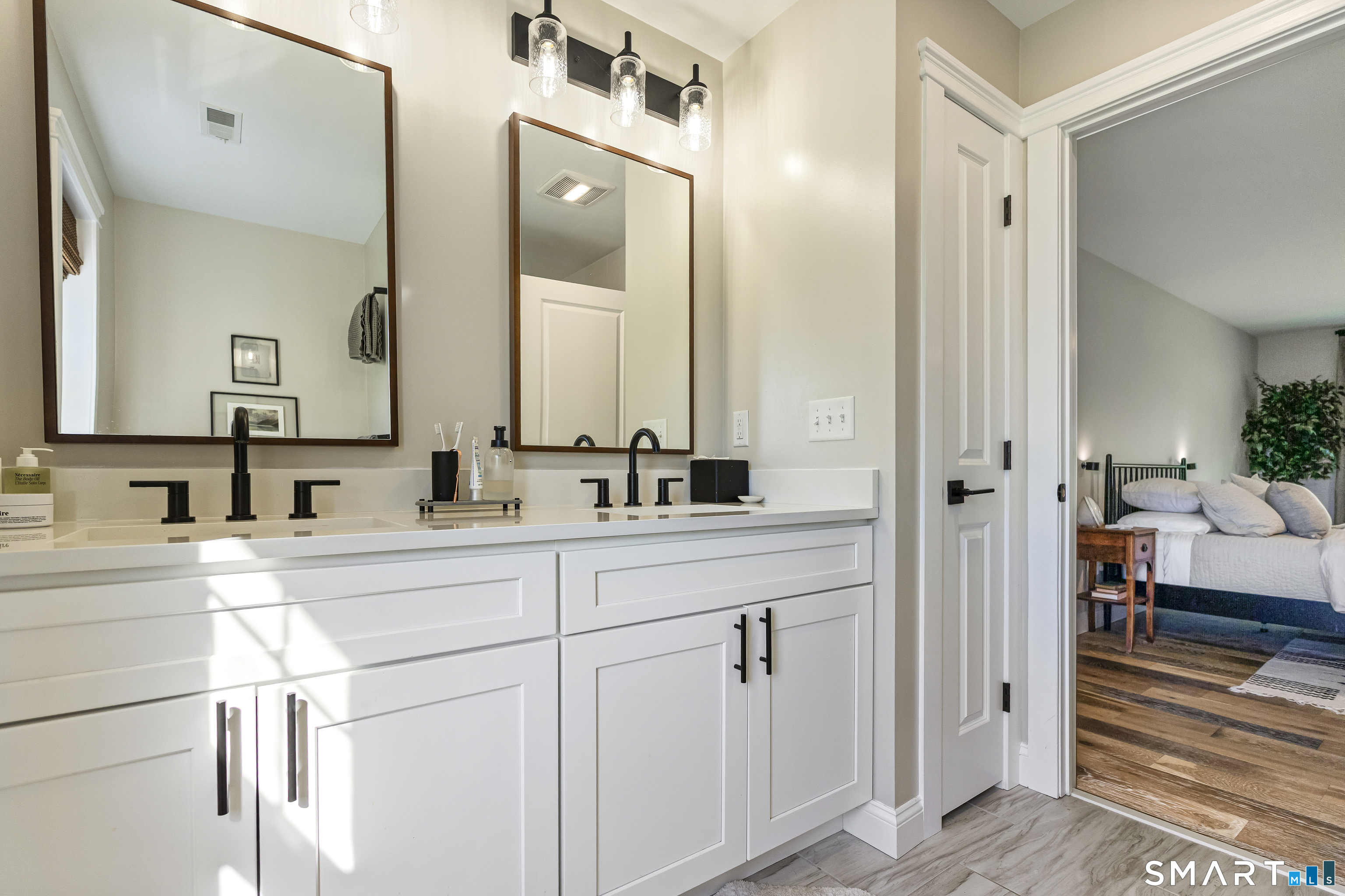 29 Beecher Road Brooklyn, CT 06234 - Photo 30 of 40 a bathroom with a sink and a mirror