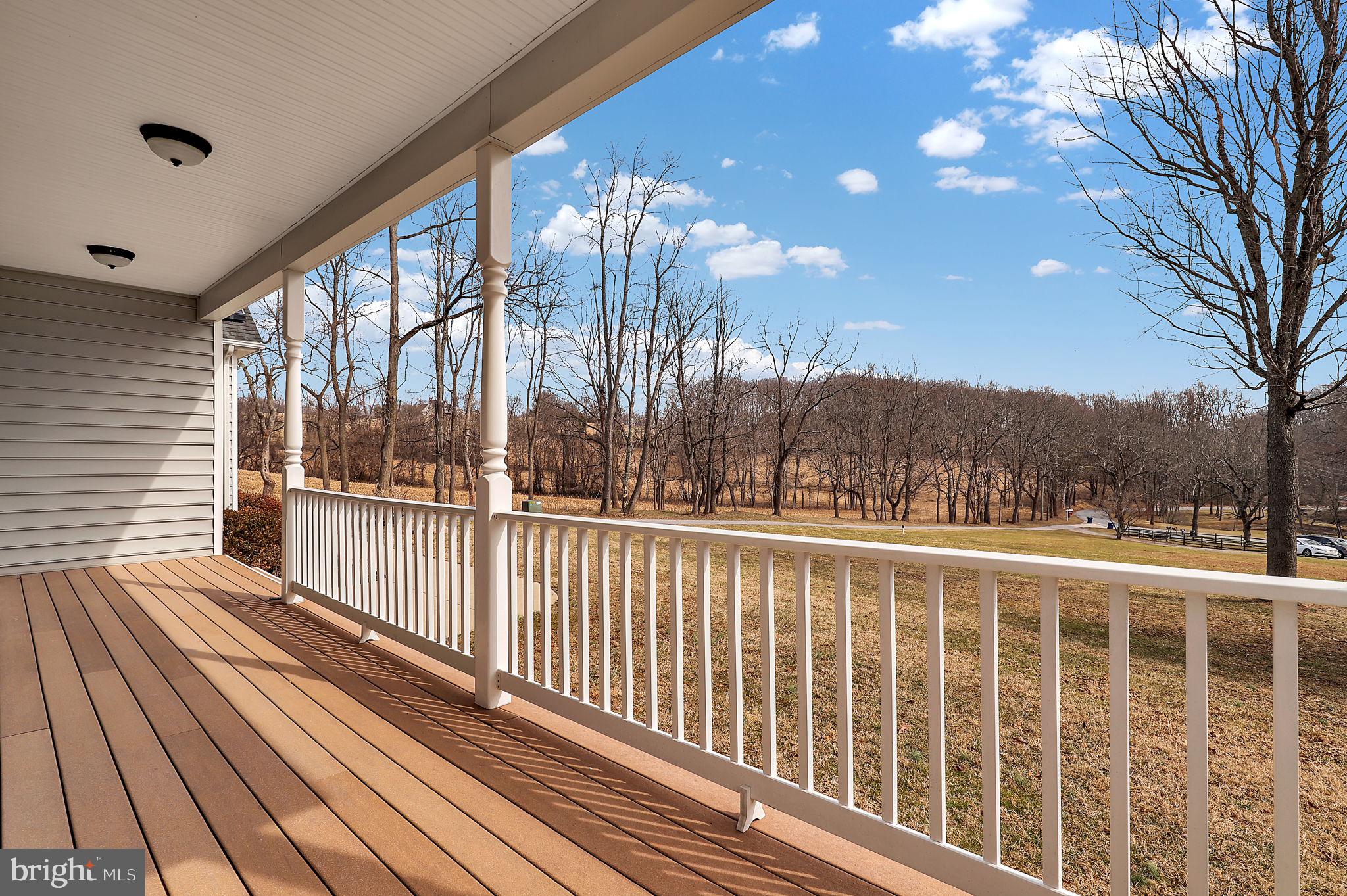 6024 Old Bohn Road Mount Airy, MD 21771 - Photo 2 of 46 a view of a balcony with wooden floor