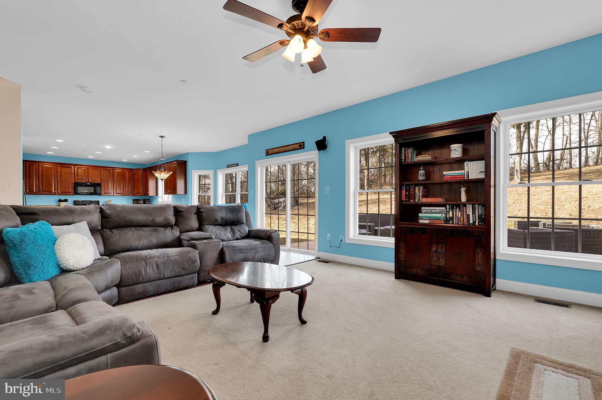6024 Old Bohn Road Mount Airy, MD 21771 - Photo 21 of 46 a living room with furniture and a window