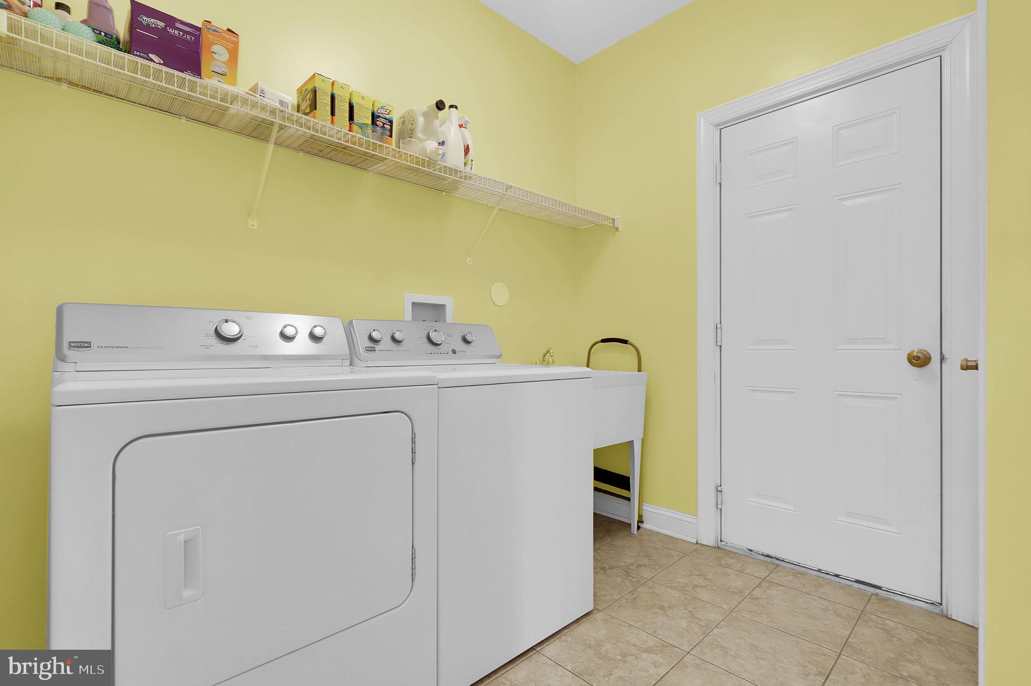 6024 Old Bohn Road Mount Airy, MD 21771 - Photo 23 of 46 a utility room with dryer and washer