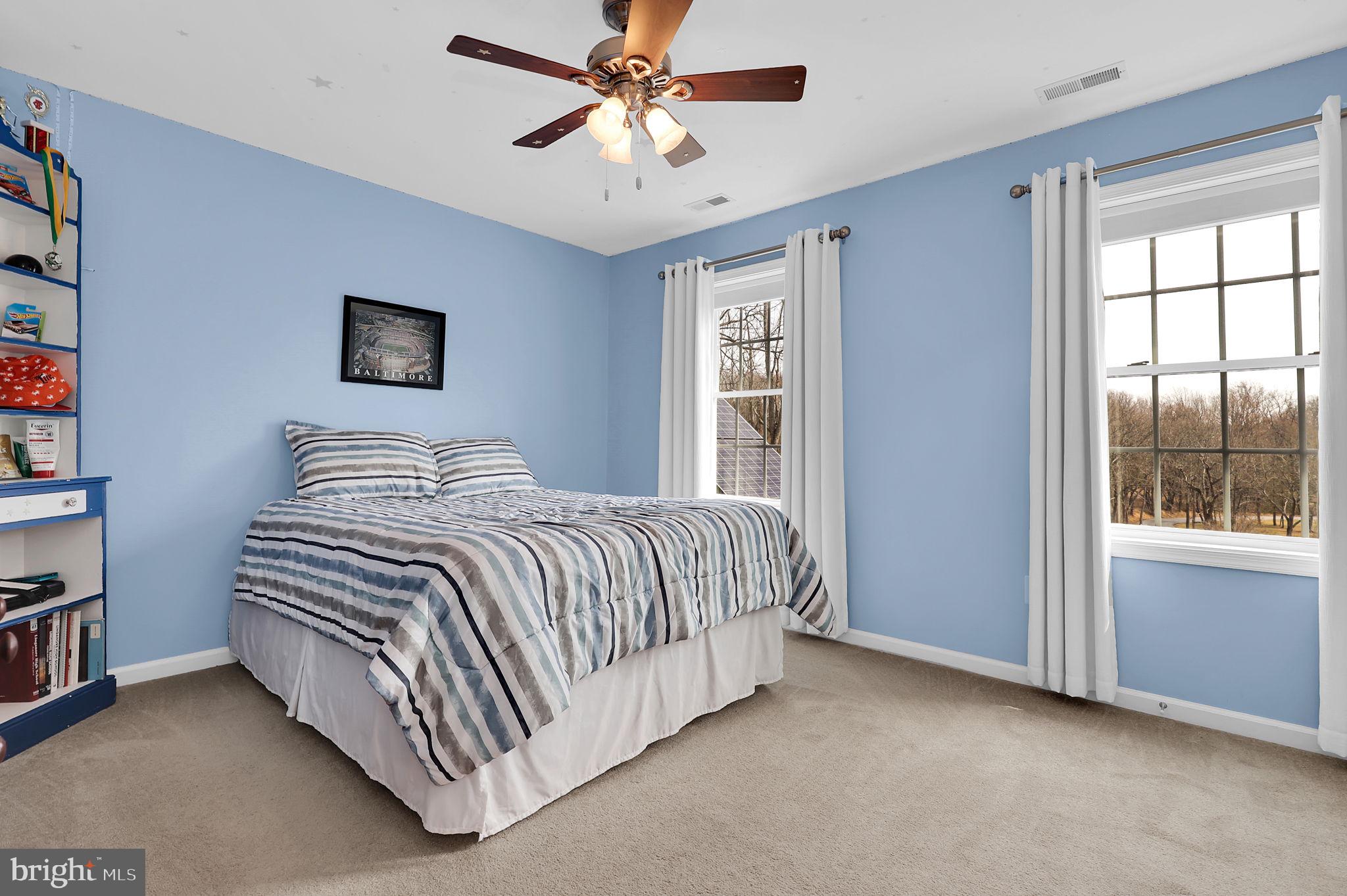 6024 Old Bohn Road Mount Airy, MD 21771 - Photo 34 of 46 a bedroom with a bed and a window