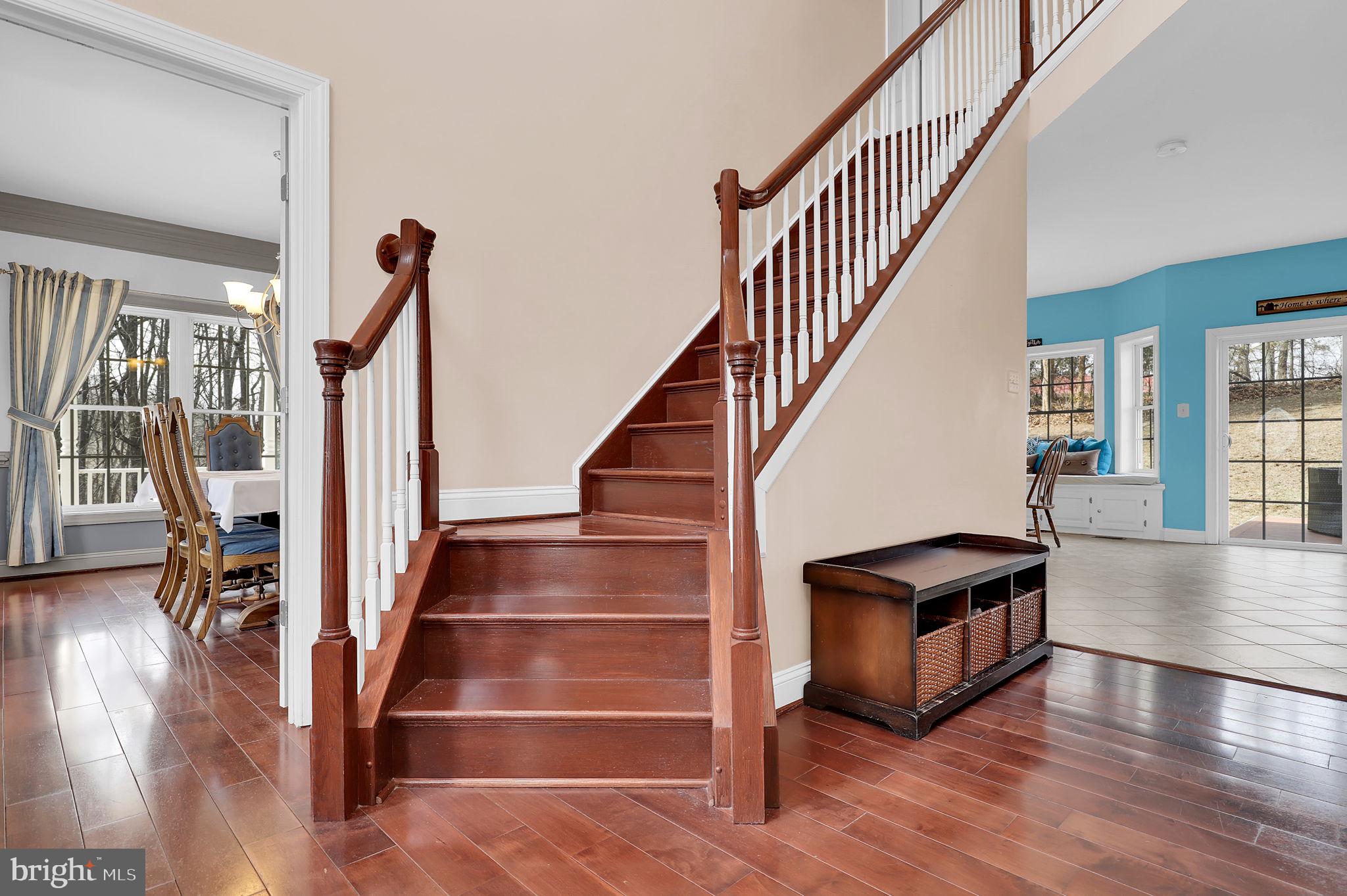 6024 Old Bohn Road Mount Airy, MD 21771 - Photo 8 of 46 a view of entryway and hall with wooden floor