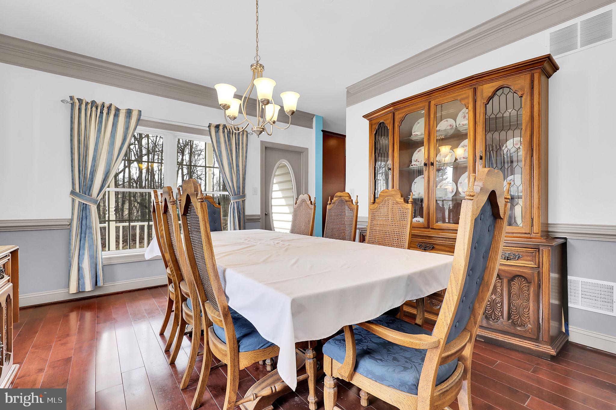 6024 Old Bohn Road Mount Airy, MD 21771 - Photo 9 of 46 a view of a dining room with furniture window and wooden floor