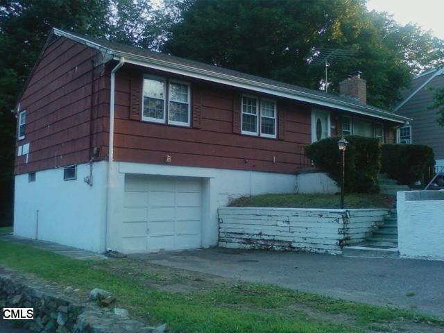 2115 Old Town Road Bridgeport, CT 06606 - Photo 1 of 1 a view of backyard of house