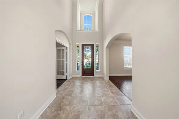 a view of hallway with windows