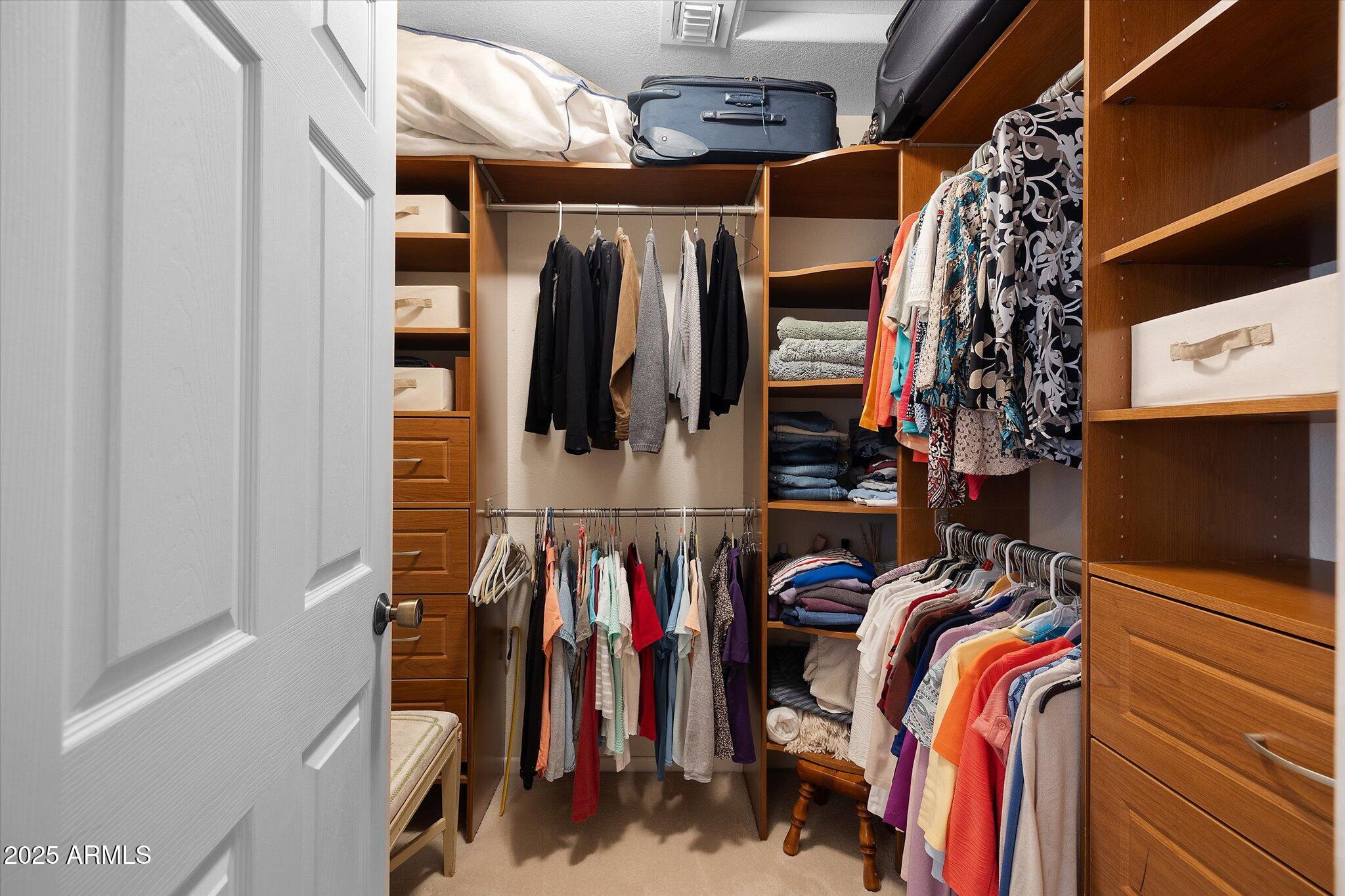 129 West Mt Ord Circle Payson, AZ 85541 - Photo 12 of 40 a view of walk in closet with clothes and shoes