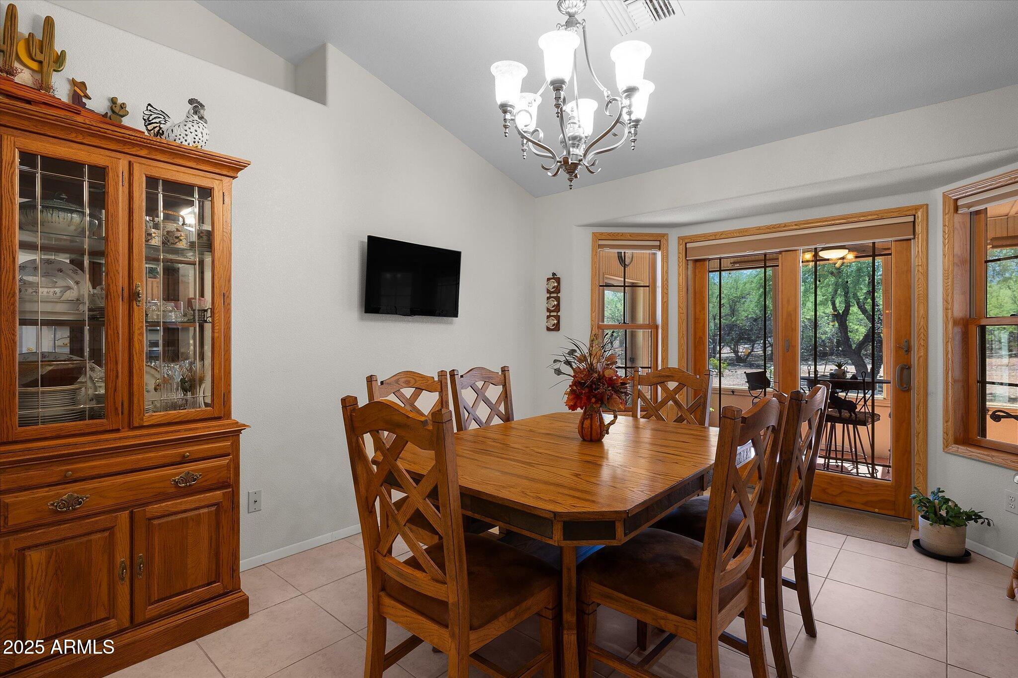 129 West Mt Ord Circle Payson, AZ 85541 - Photo 14 of 40 a view of a dining room with furniture window and outside view