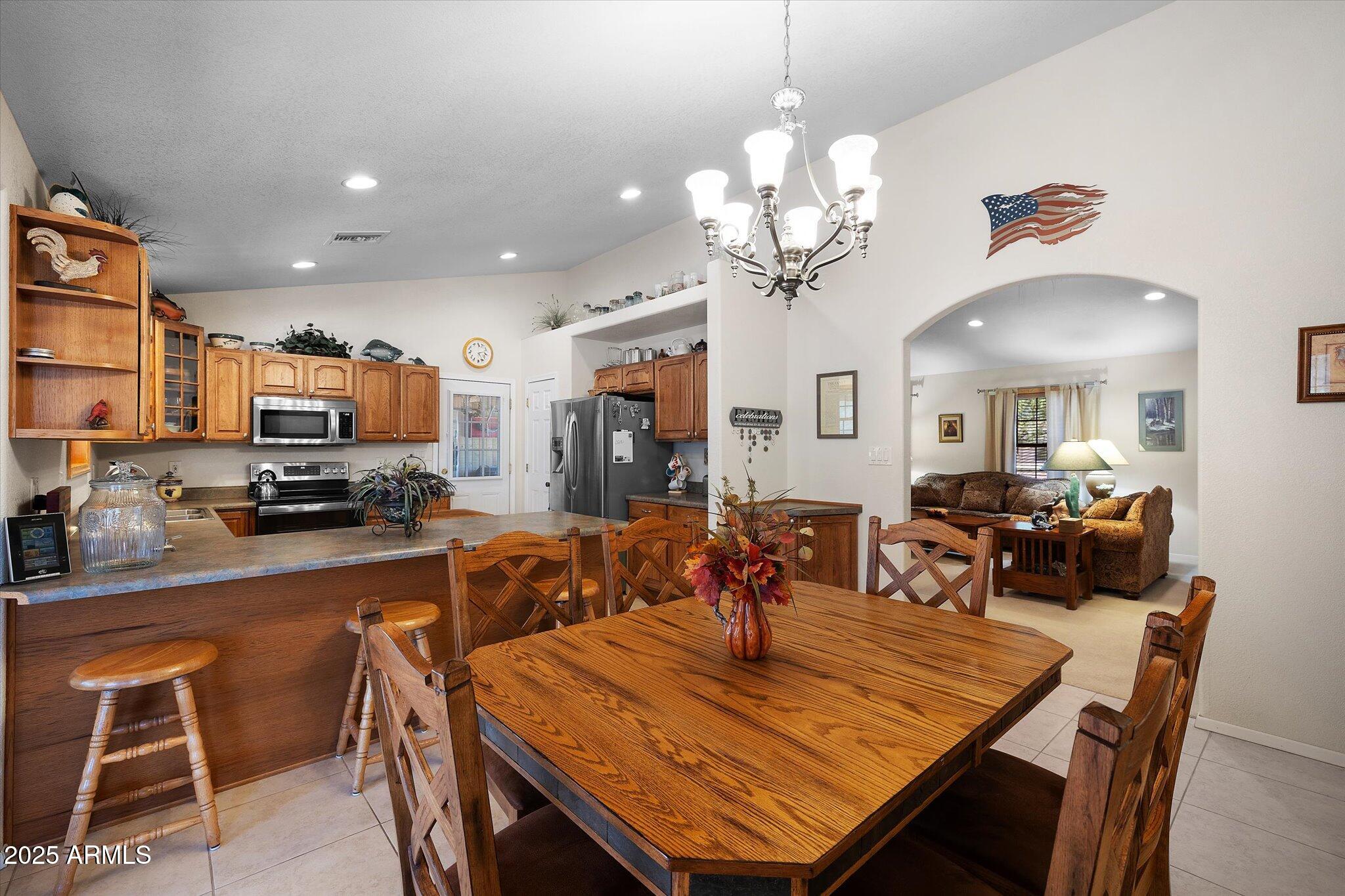 129 West Mt Ord Circle Payson, AZ 85541 - Photo 15 of 40 a view of a dining room with furniture