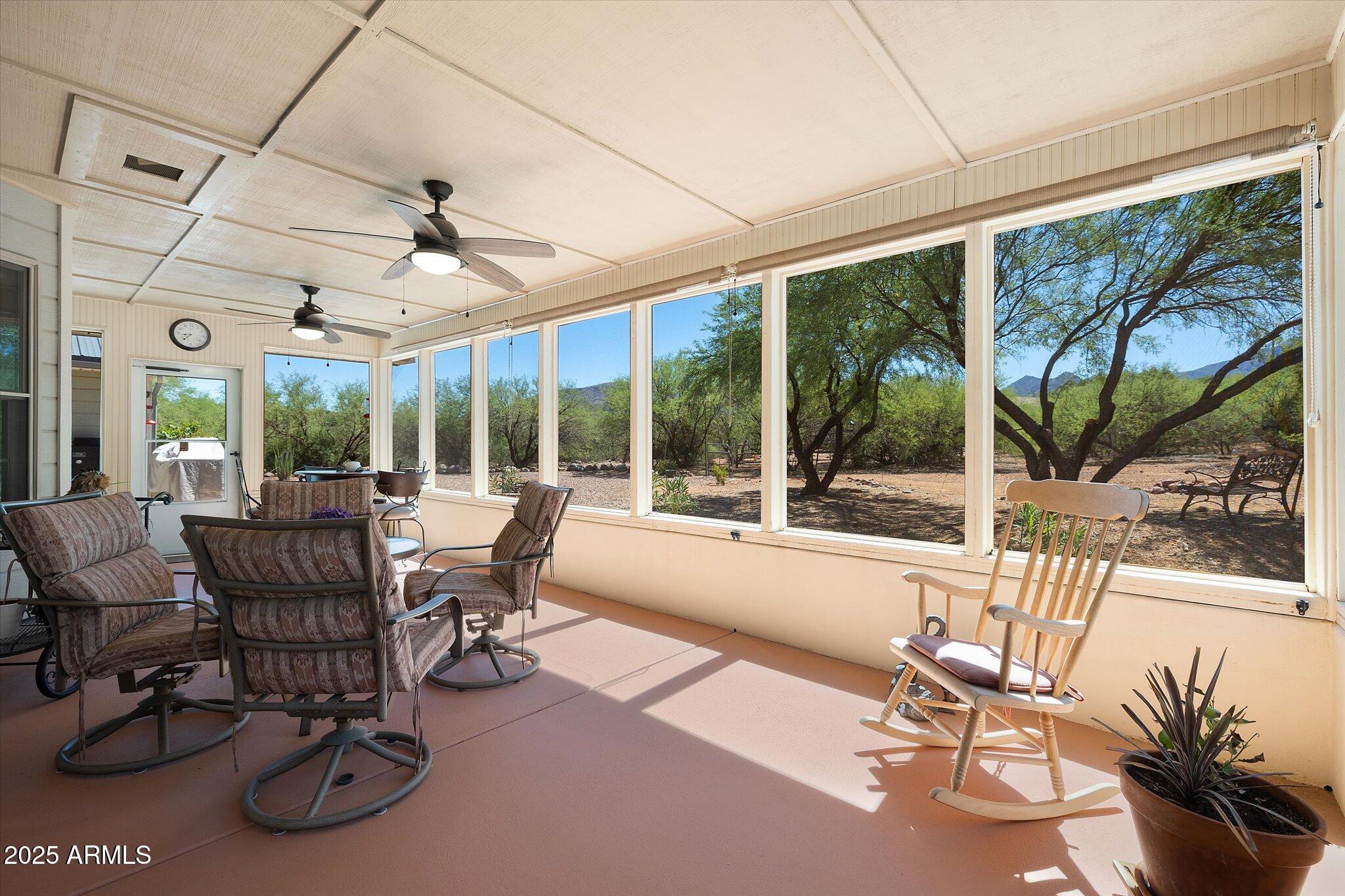 129 West Mt Ord Circle Payson, AZ 85541 - Photo 18 of 40 a view of a patio with a dining table and chairs