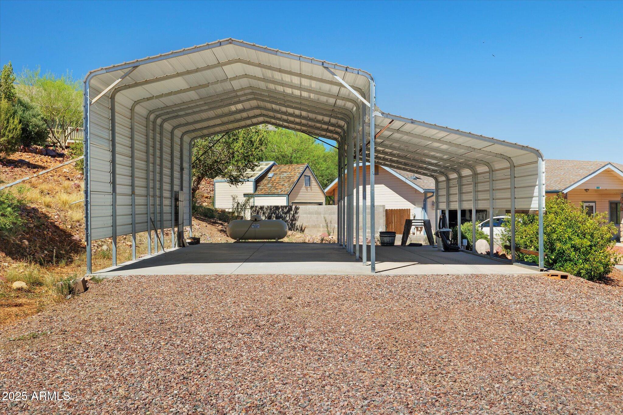 129 West Mt Ord Circle Payson, AZ 85541 - Photo 28 of 40 a front view of a house with a garden