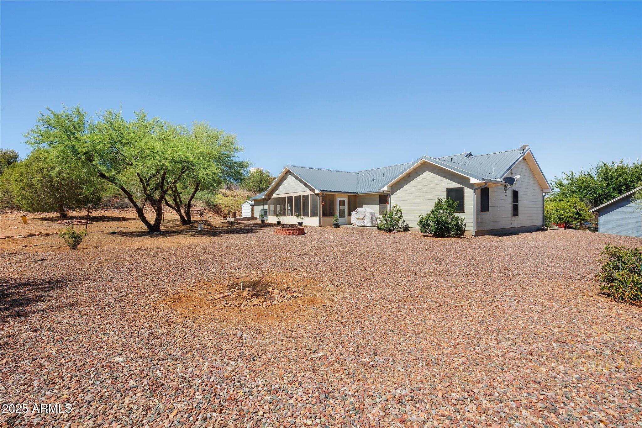 129 West Mt Ord Circle Payson, AZ 85541 - Photo 30 of 40 a front view of a house with a yard