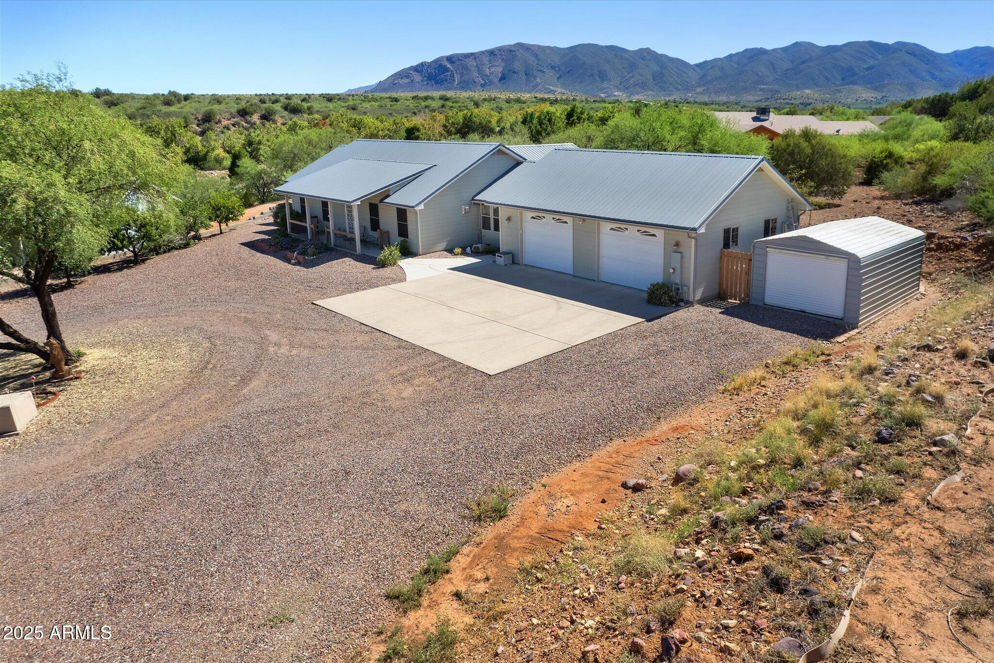 129 West Mt Ord Circle Payson, AZ 85541 - Photo 3 of 40 a view of a house with a yard