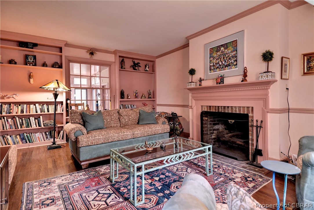 301 Indian Springs Road Williamsburg, VA 23185 - Photo 3 of 25 Family room with built-ins and fireplace.