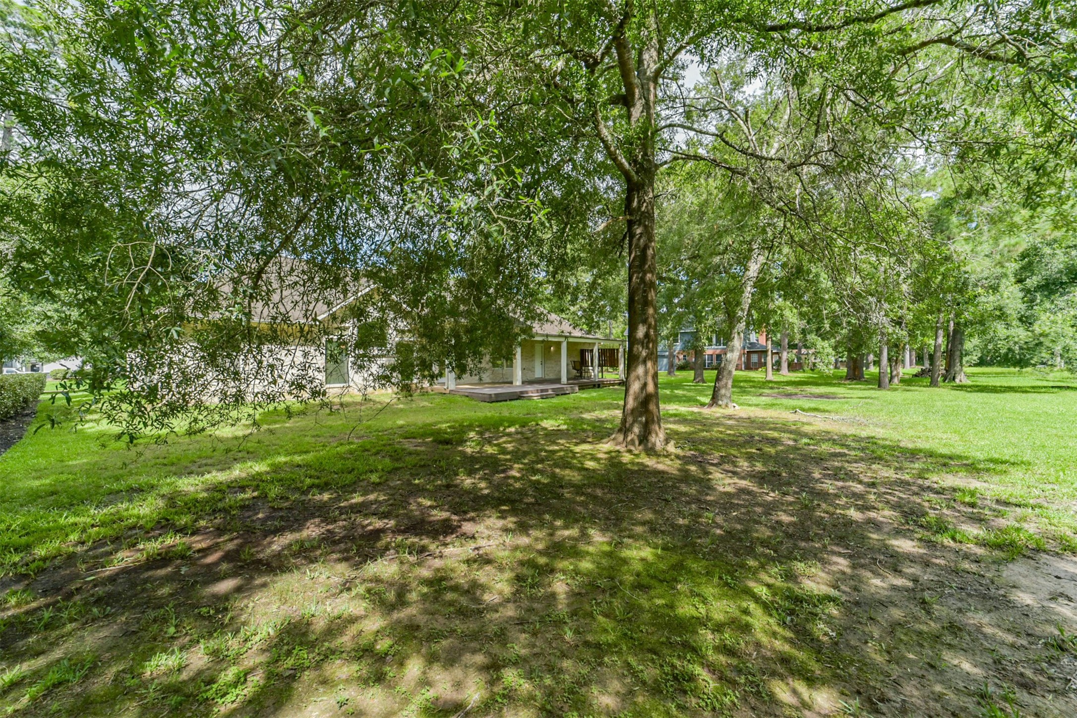 27322 Afton Way Huffman, TX 77336 - Photo 49 of 50 Peaceful wooded setting creates a private oasis with plenty of room to roam and enjoy nature.