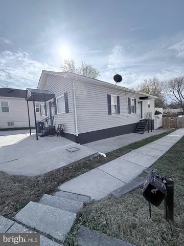 a house view with a backyard space