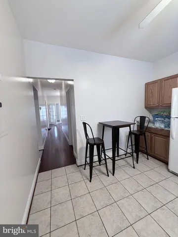 a view of kitchen with furniture and window