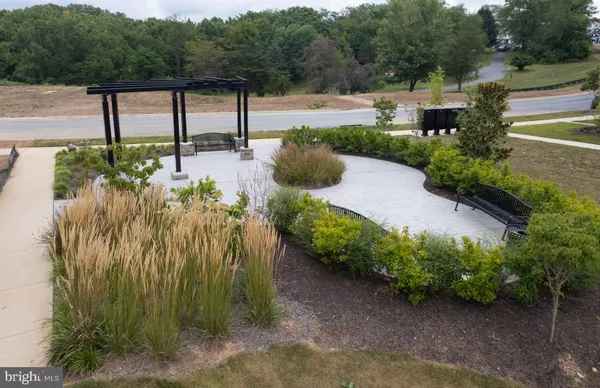 a view of a garden with a fountain