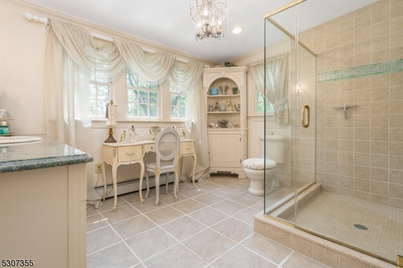 1 Dove Hollow Lane Hampton, NJ 08827 - Photo 25 of 49 a spacious bathroom with a shower and a sink a mirror