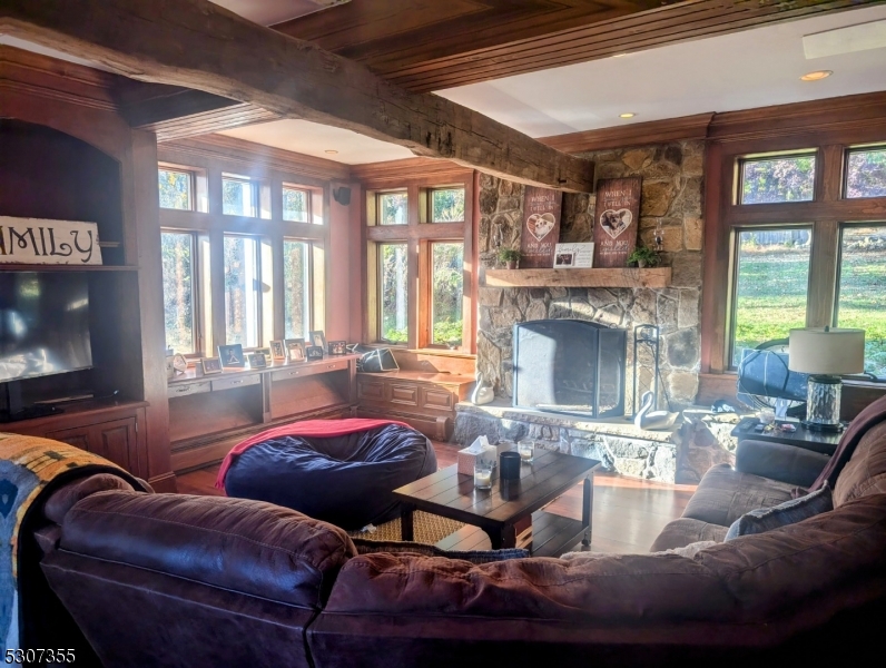 1 Dove Hollow Lane Hampton, NJ 08827 - Photo 38 of 49 a living room with furniture and a fireplace