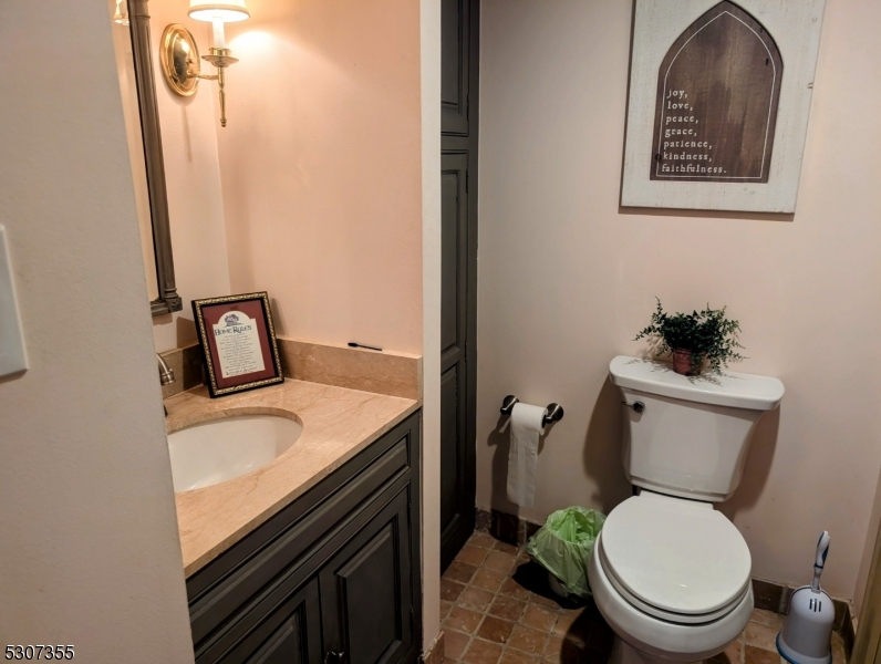 1 Dove Hollow Lane Hampton, NJ 08827 - Photo 42 of 49 a bathroom with a toilet sink and mirror