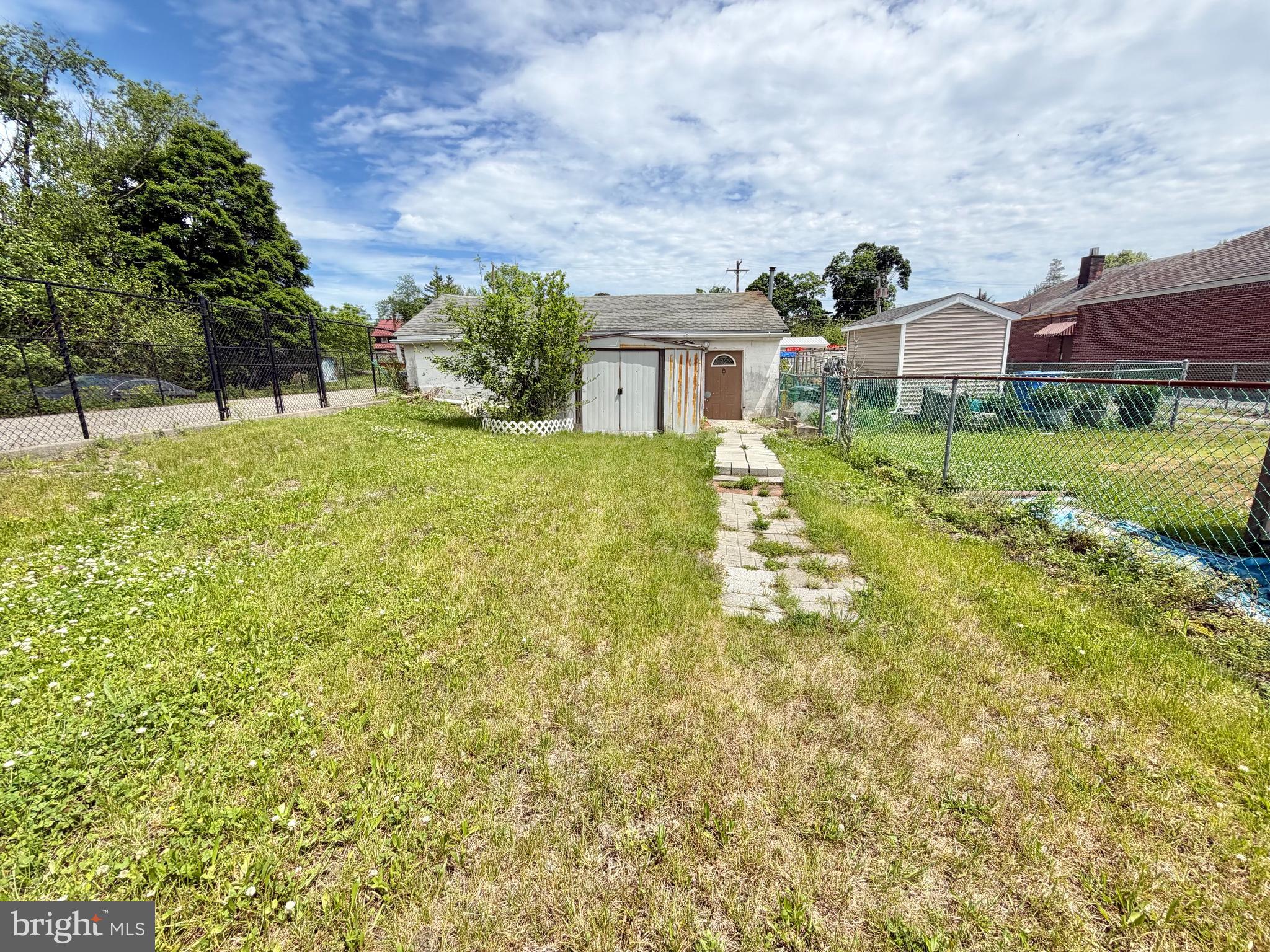 66 Hanover Street Pemberton, NJ 08068 - Photo 47 of 56 Backyard leading to rear detached garage