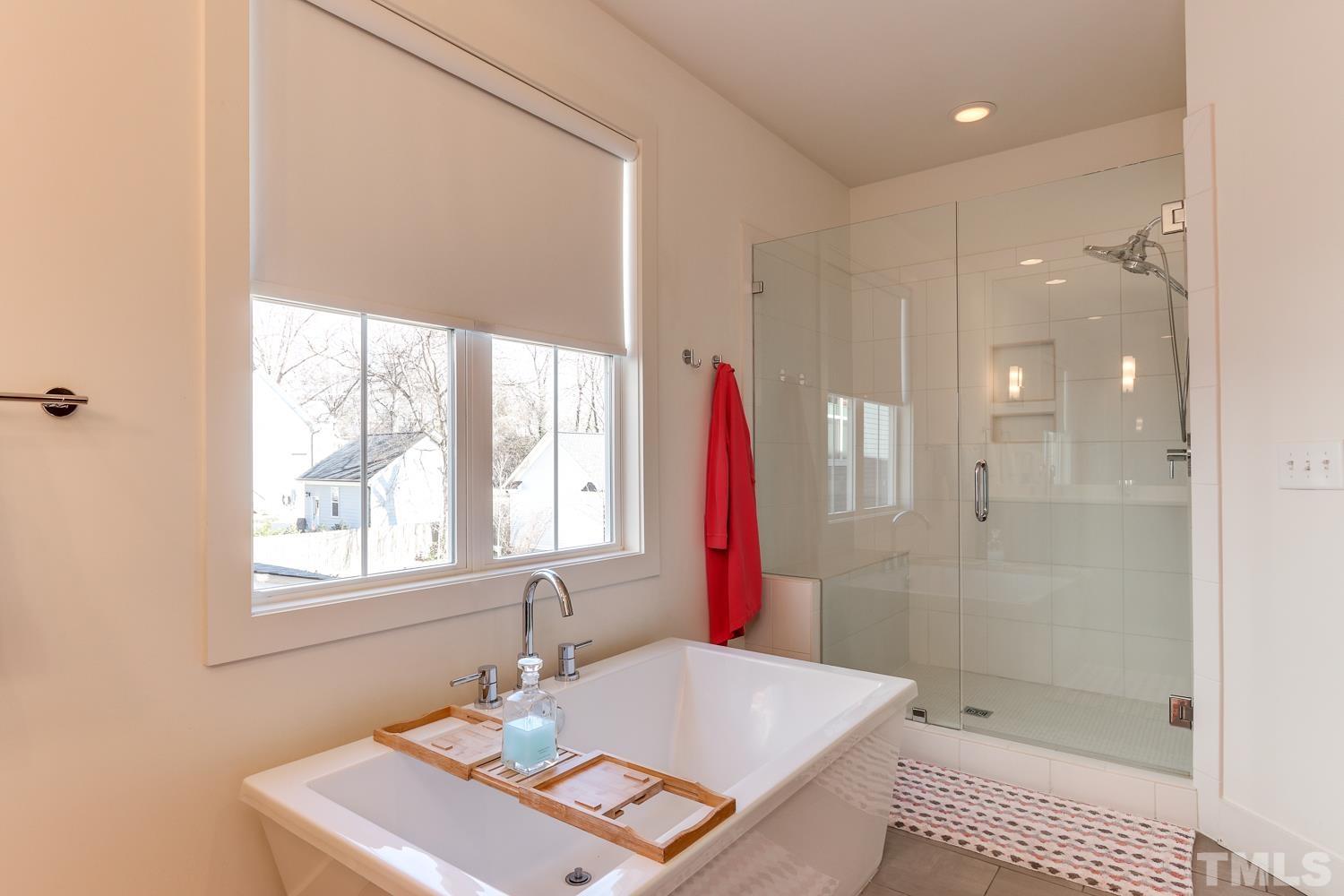 107 Revival Way Raleigh, NC 27608 - Photo 16 of 31 a bathroom with a sink and a mirror