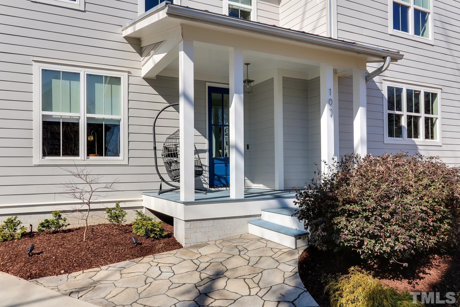 107 Revival Way Raleigh, NC 27608 - Photo 2 of 31 a front view of a house