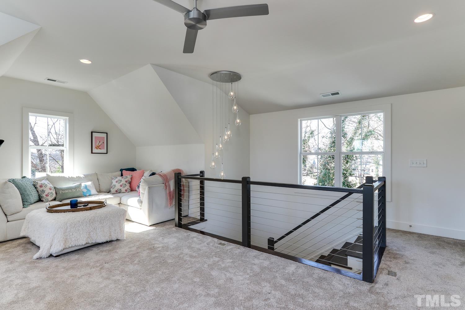 107 Revival Way Raleigh, NC 27608 - Photo 23 of 31 a living room with furniture and a window